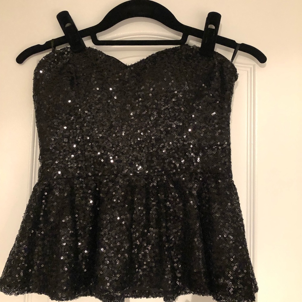 Jaw dropping black sequence, strapless, bustier with peplum